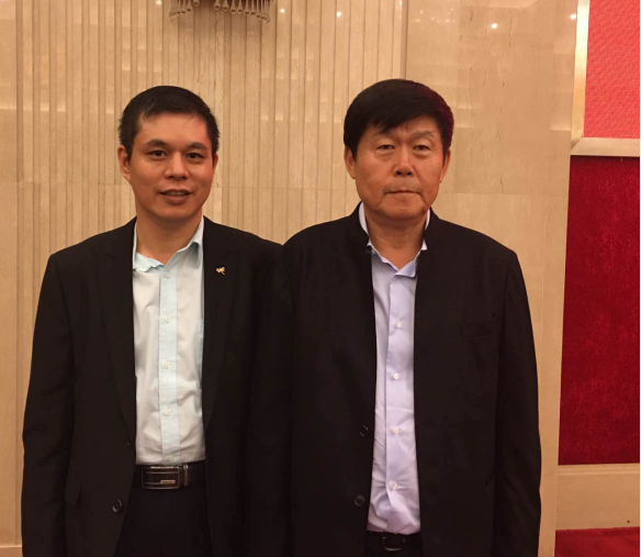 bjl官网登录董事长郑两斌与北京黑龙江企业商会会长田在玮合影